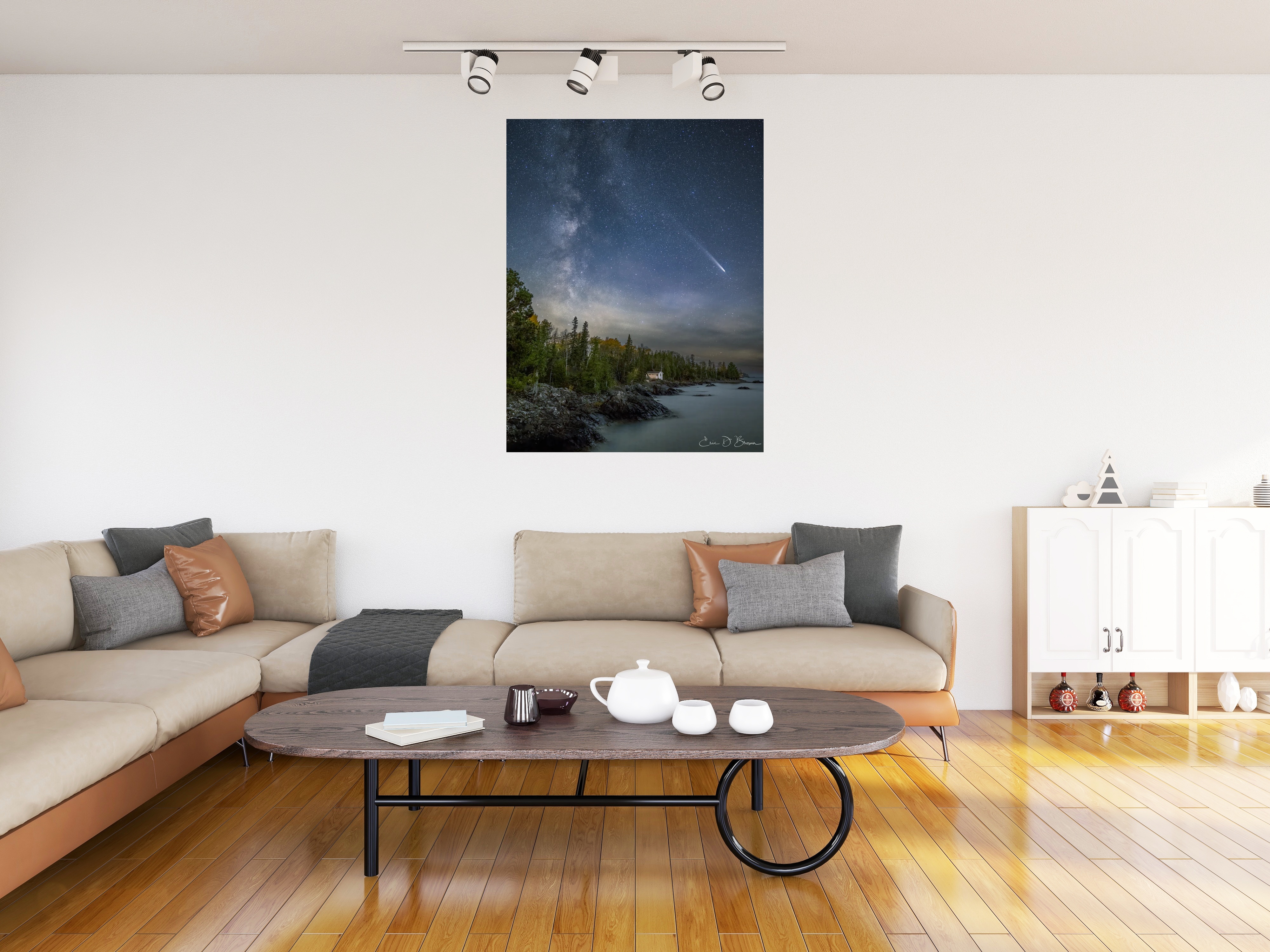 Room visualization showing Michigan's Night Sky Spectacle: Comet Tsuchinshan-ATLAS and the Milky Way hanging on a wall in a modern living room setting