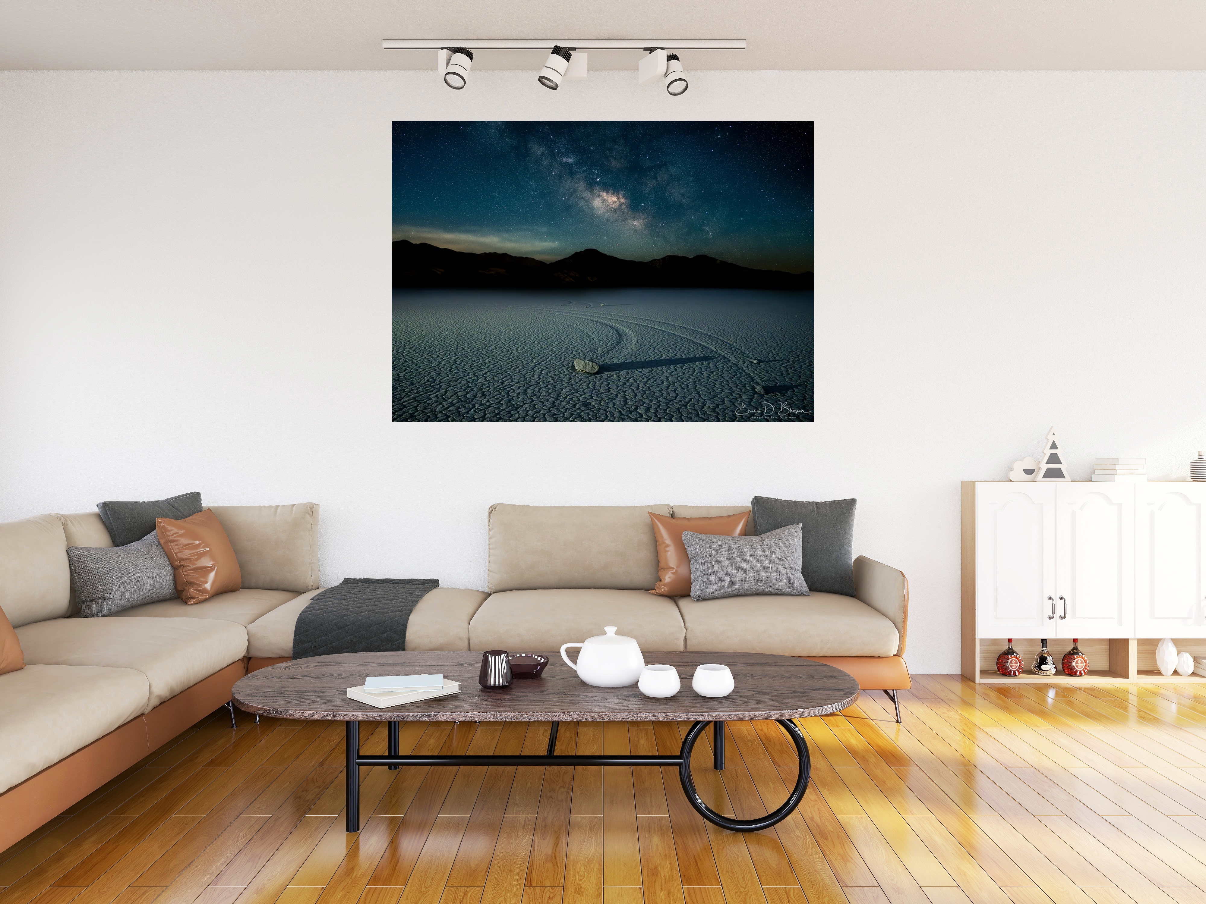 Room visualization showing The Moving Rocks hanging on a wall in a modern living room setting