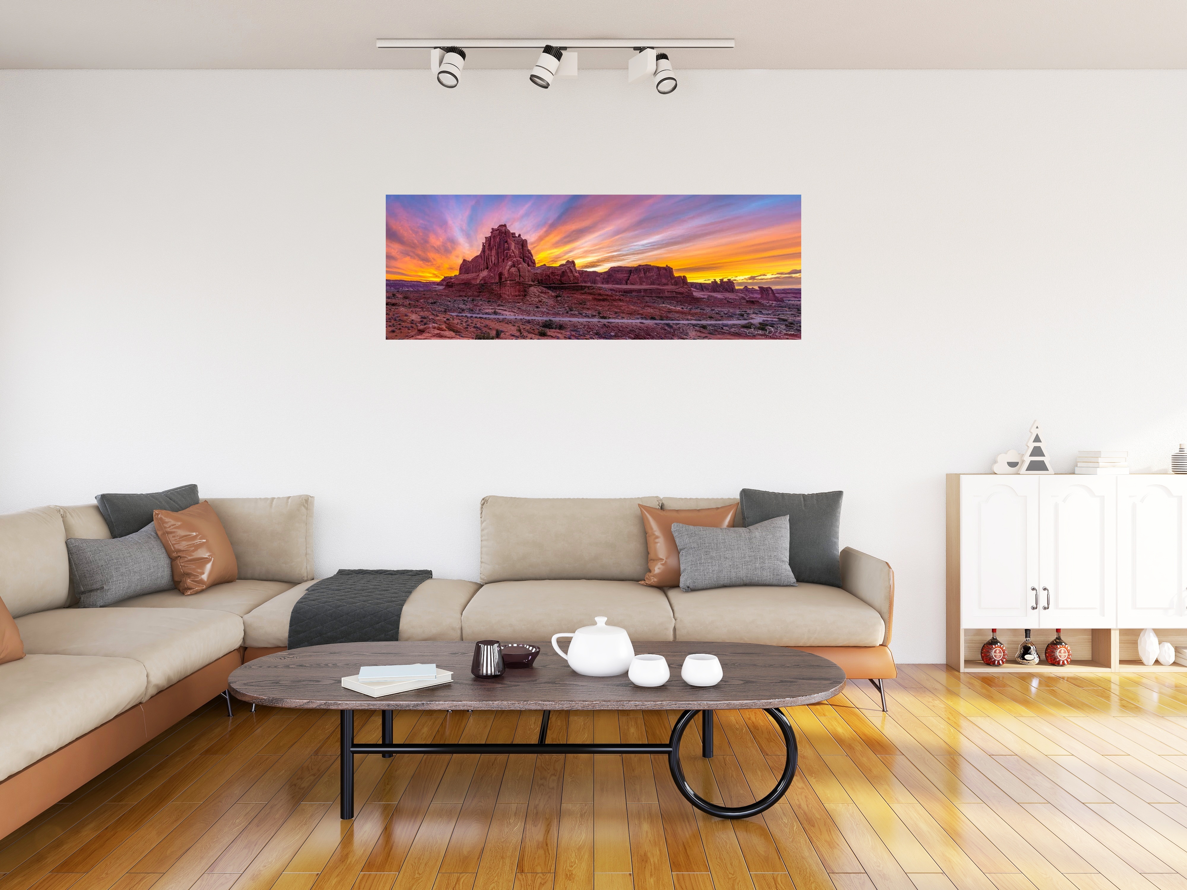 Room visualization showing Arches Natonal Park - Park Avenue Sunset hanging on a wall in a modern living room setting