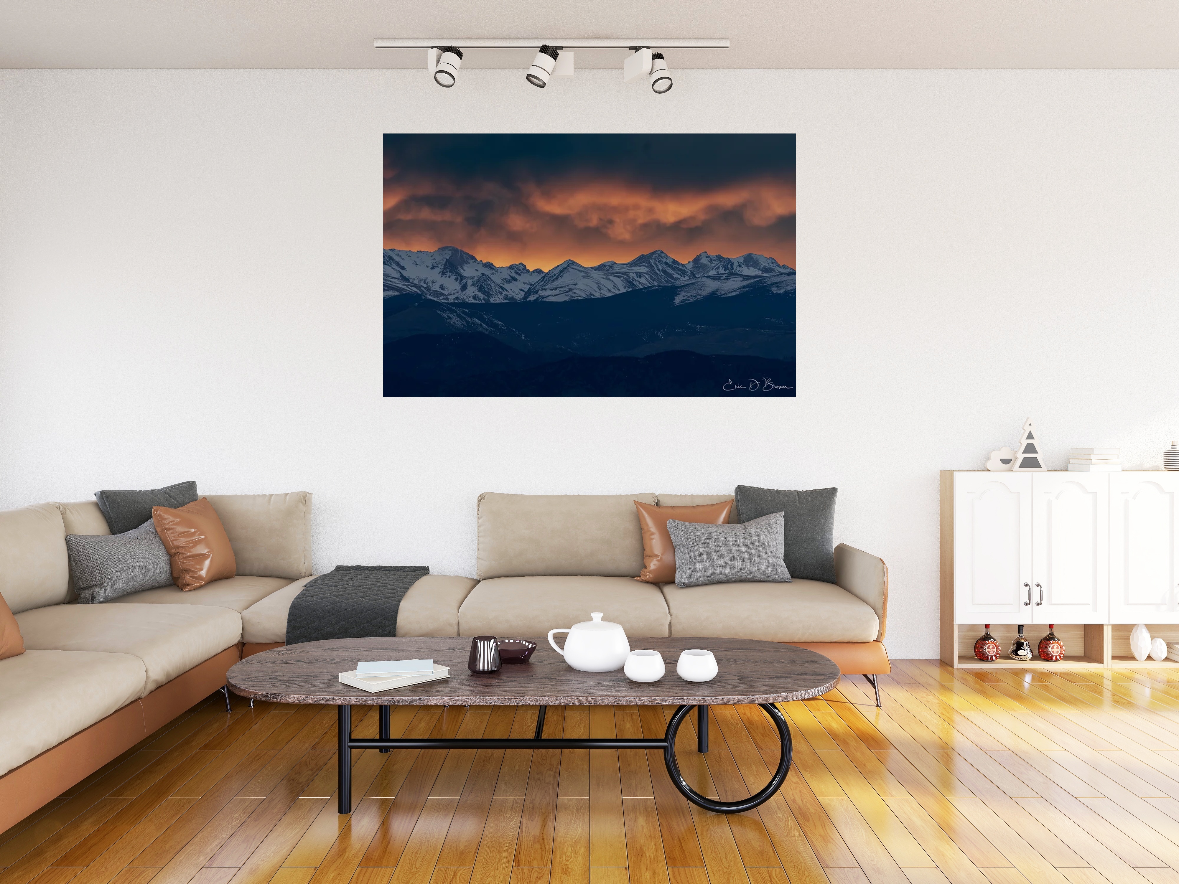 Room visualization showing Colorado Rocky Mountain Alpenglow: Winter Peaks at Sunset hanging on a wall in a modern living room setting